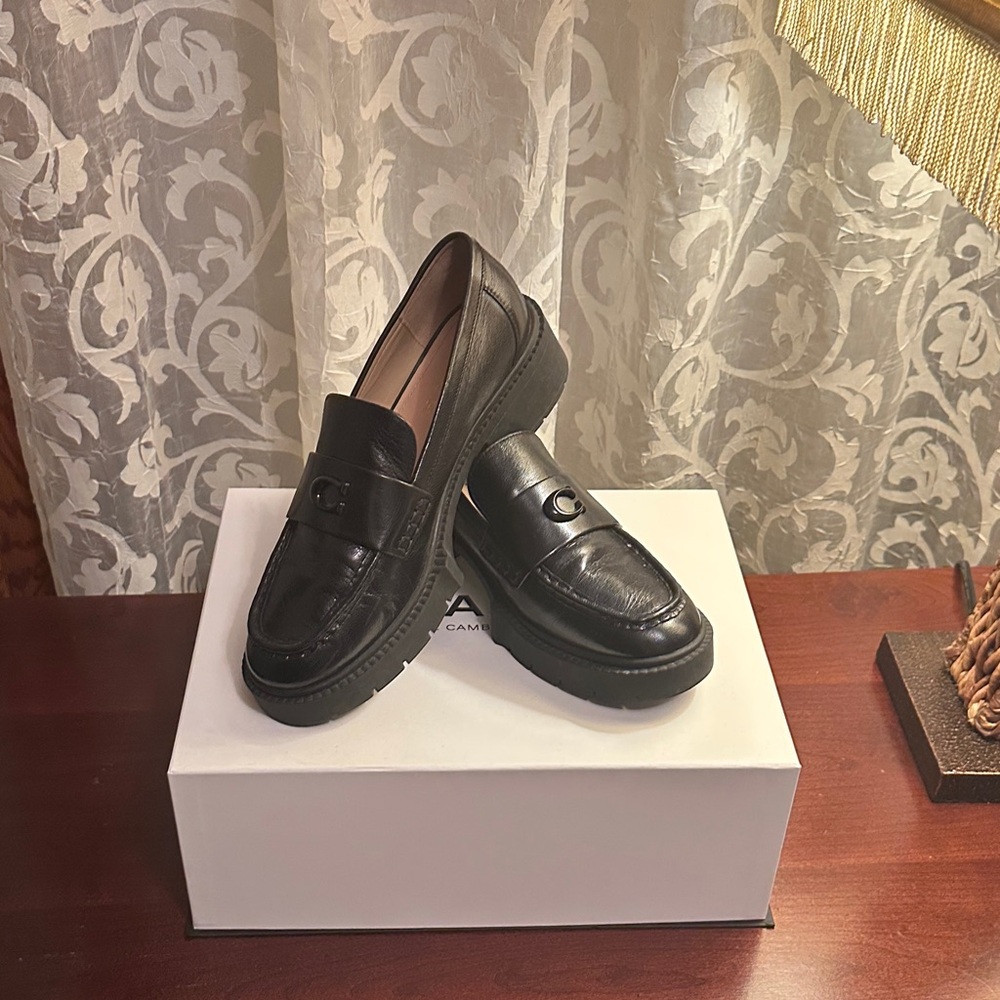 Coach Black leather lug loafers
